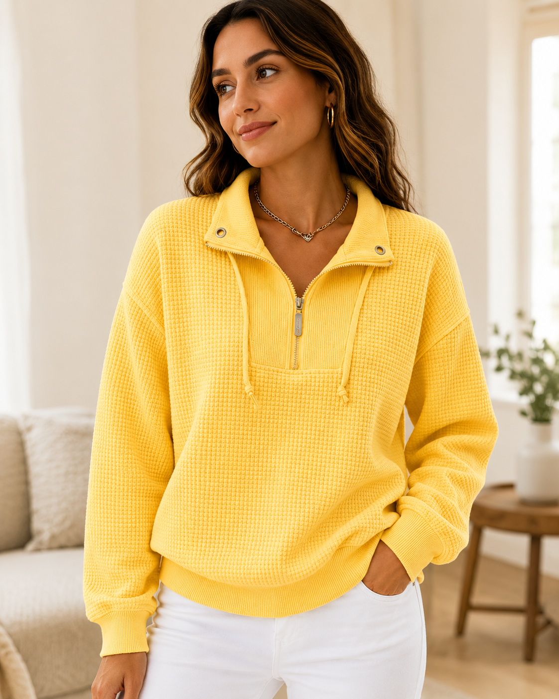 Close view of the waffle knit pullover and half zip collar