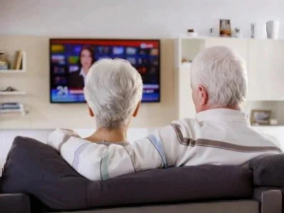 Watching television at home