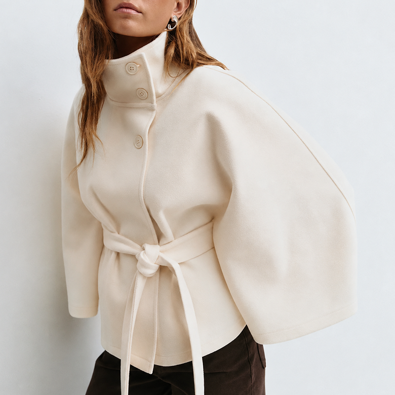 White poncho coat