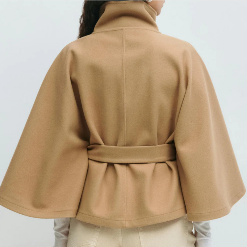 Back view of khaki belted poncho cape coat