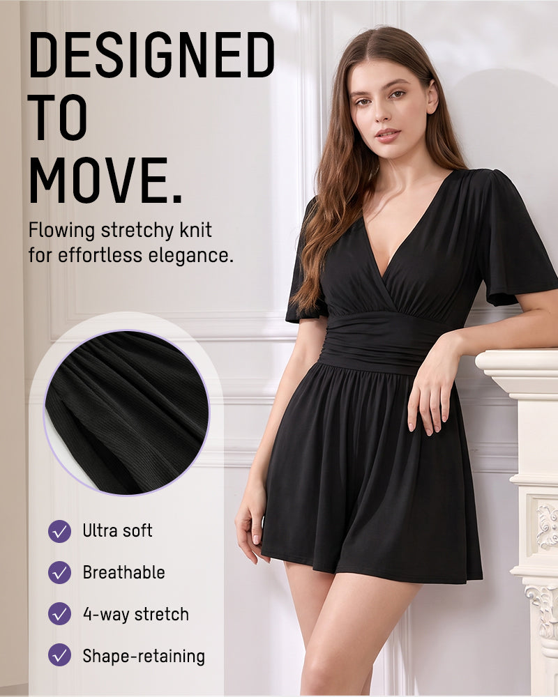 Stretch knit fabric detail of black mini dress