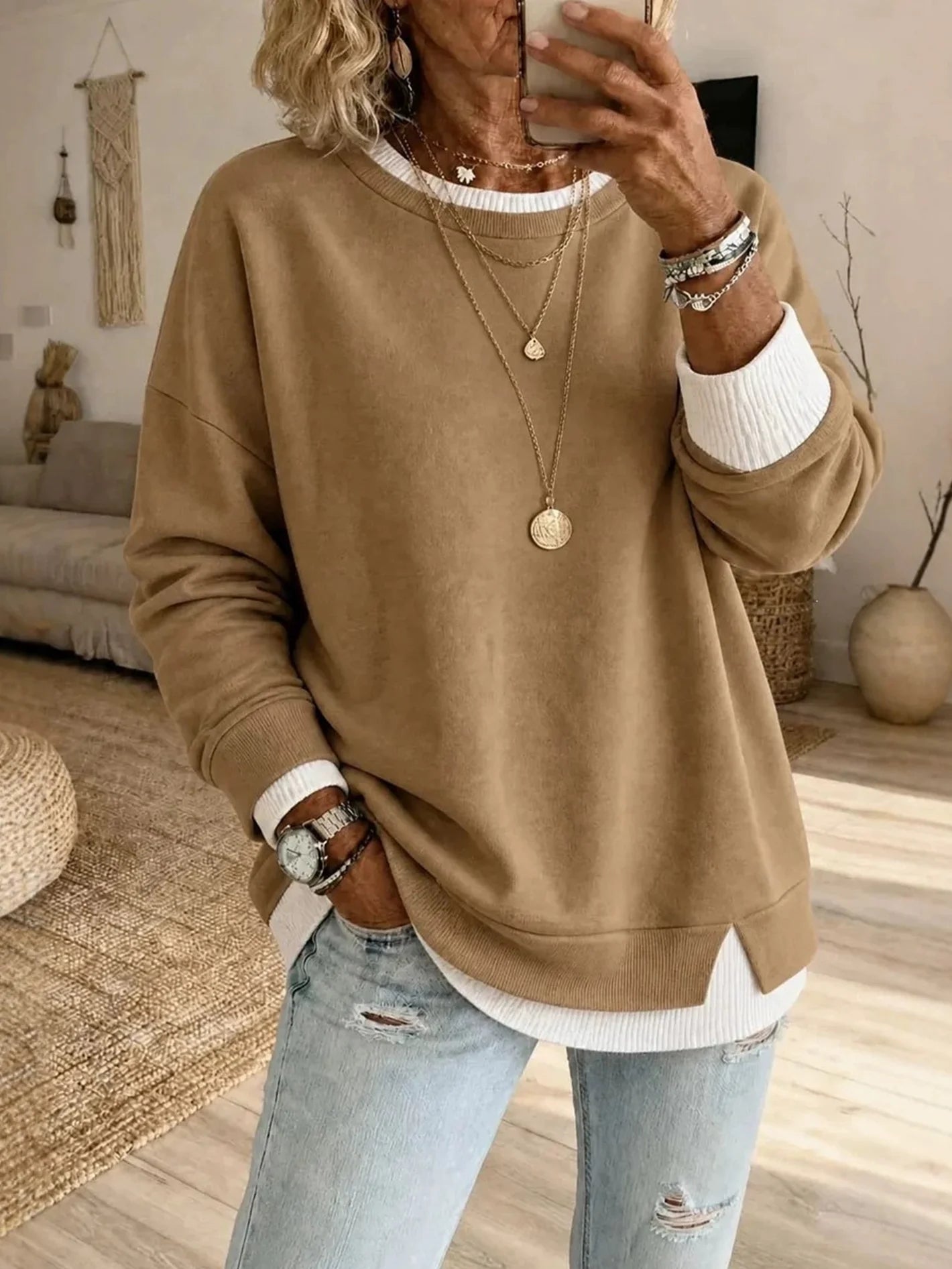 Customer wearing the brown layered sweatshirt